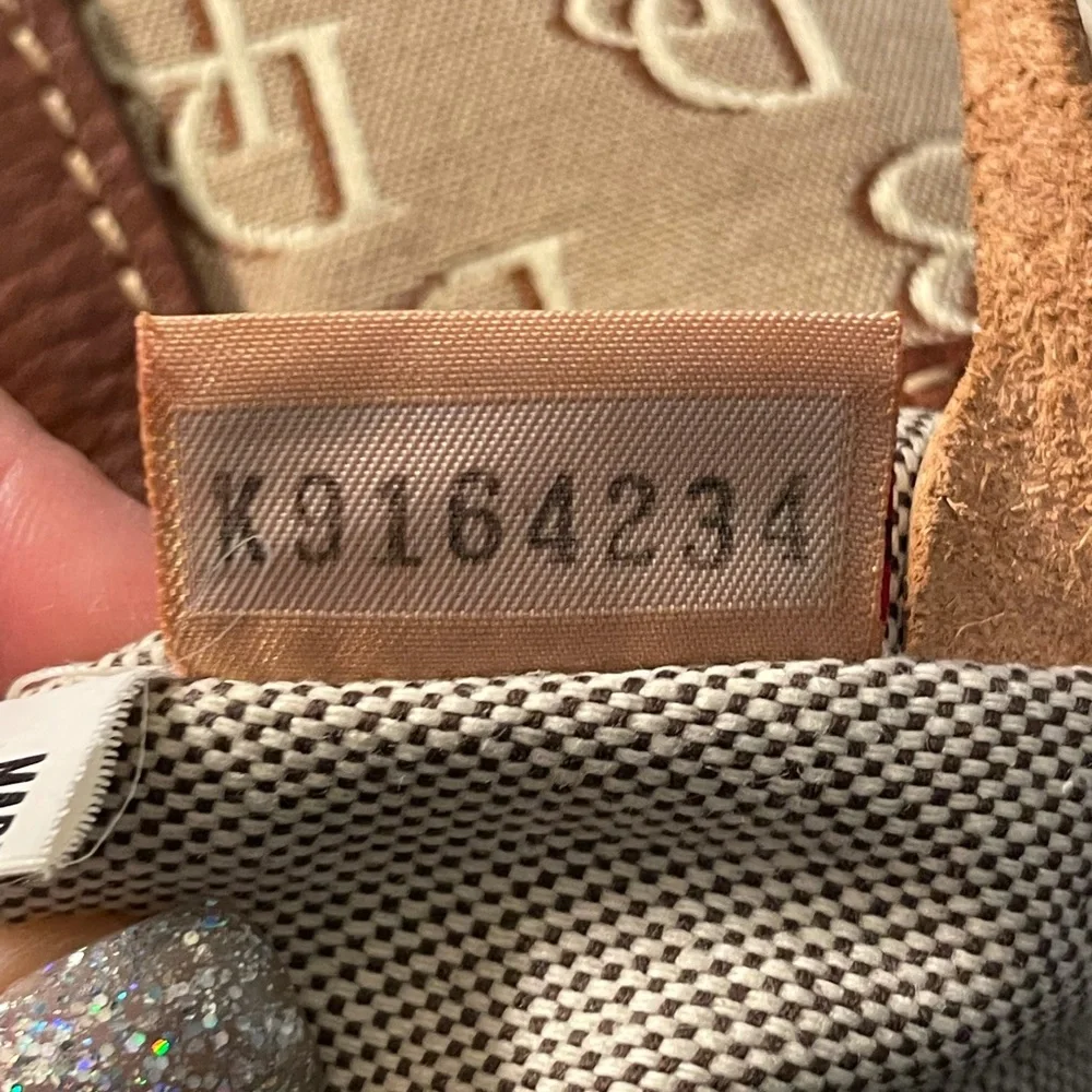 Dooney and Bourke Luisa Monogram Canvas and Leather Trim Hobo Bag in Tan